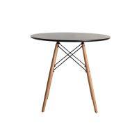 Round black dining table with wooden legs  HOMZY  DWBL